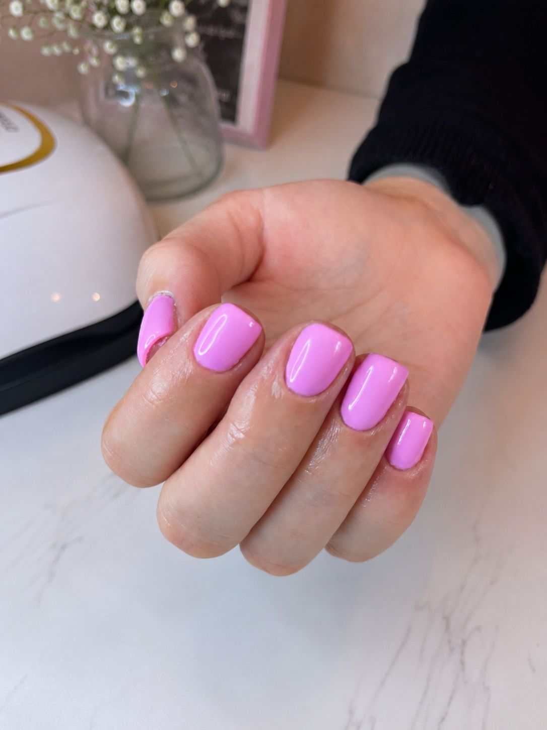 Glossy pink manicure